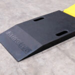 extension ramps for scissor lifts and hoists in automotive workshops