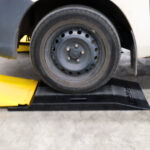 car wheel on extrension ramp